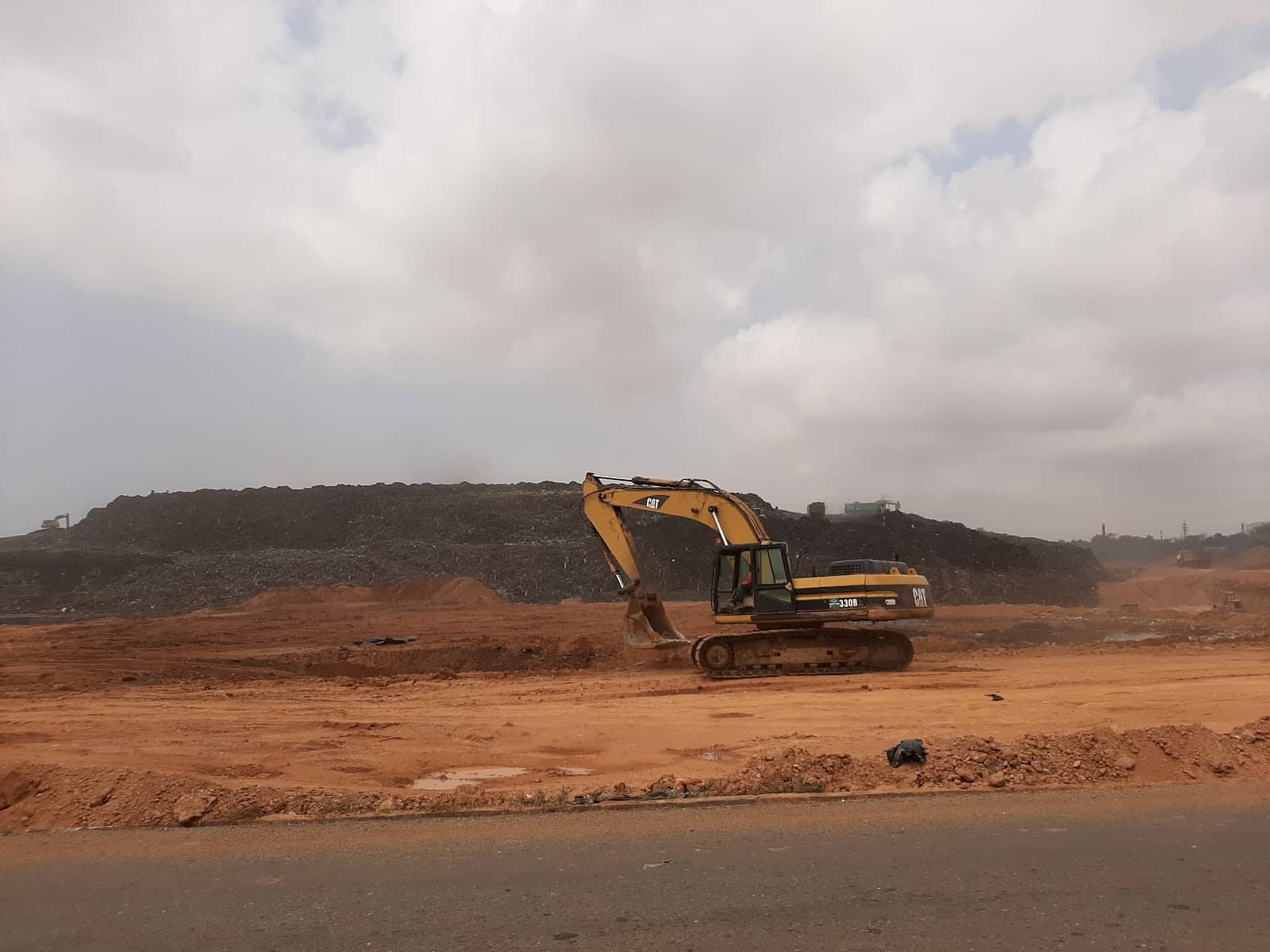 bulldozers at Kpone Landfill in Accra, Ghana
