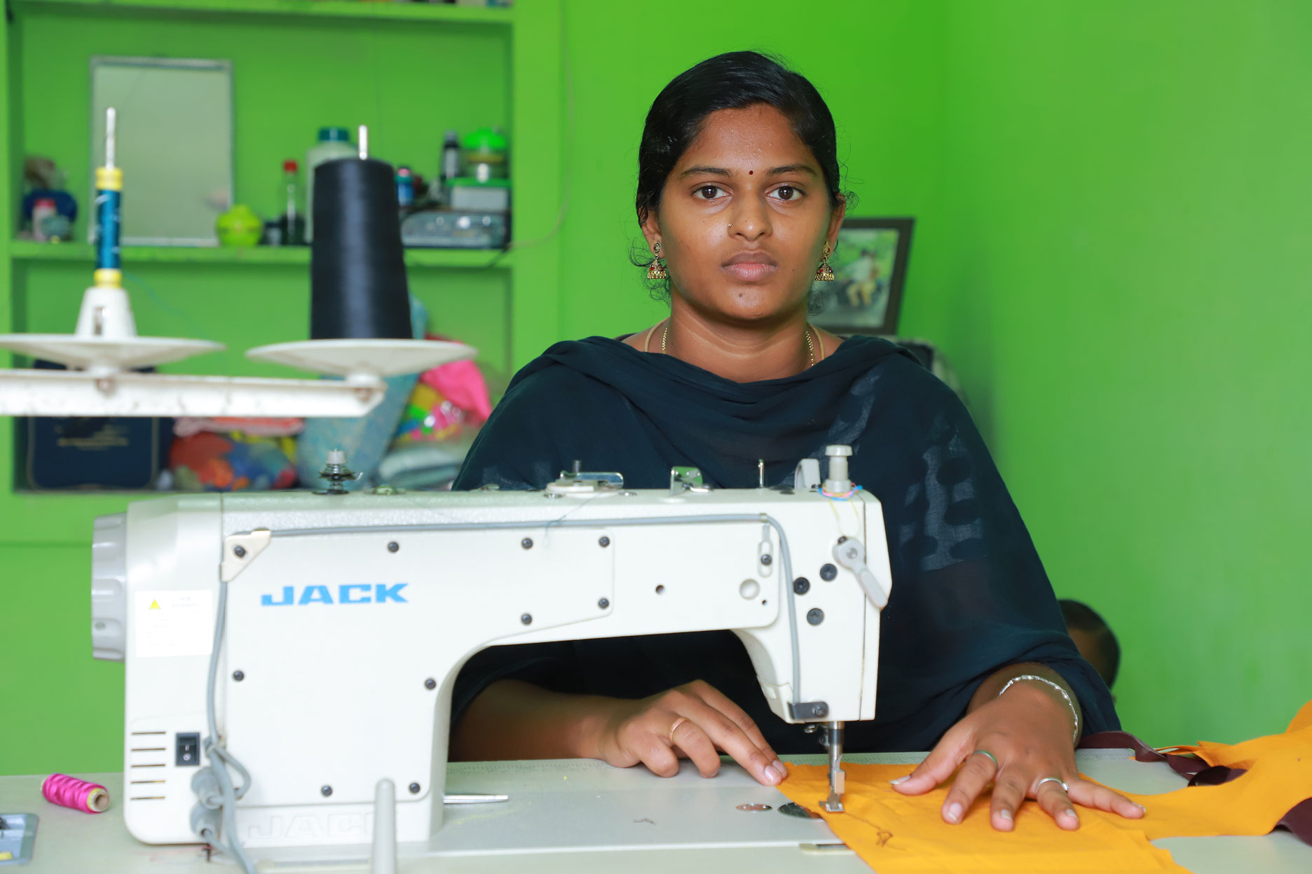 23-year-old Saranya does stitching and basket weaving from her home in Tiruppur, India