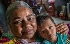 Woman with child, India