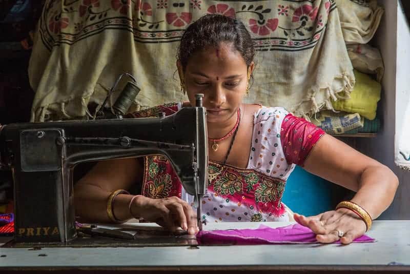 Bhavna Ramesh sews purses at home. Photo: Paula Bronstein/Getty Images/Images of Empowerment