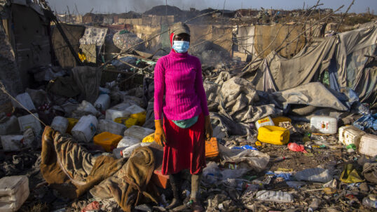 Bigué Cissé, a waste picker at the Mbeubeuss dumpsite near Dakar, Senegal, has been collecting plastic recyclables for 16 years to support her family of eight, including three children.