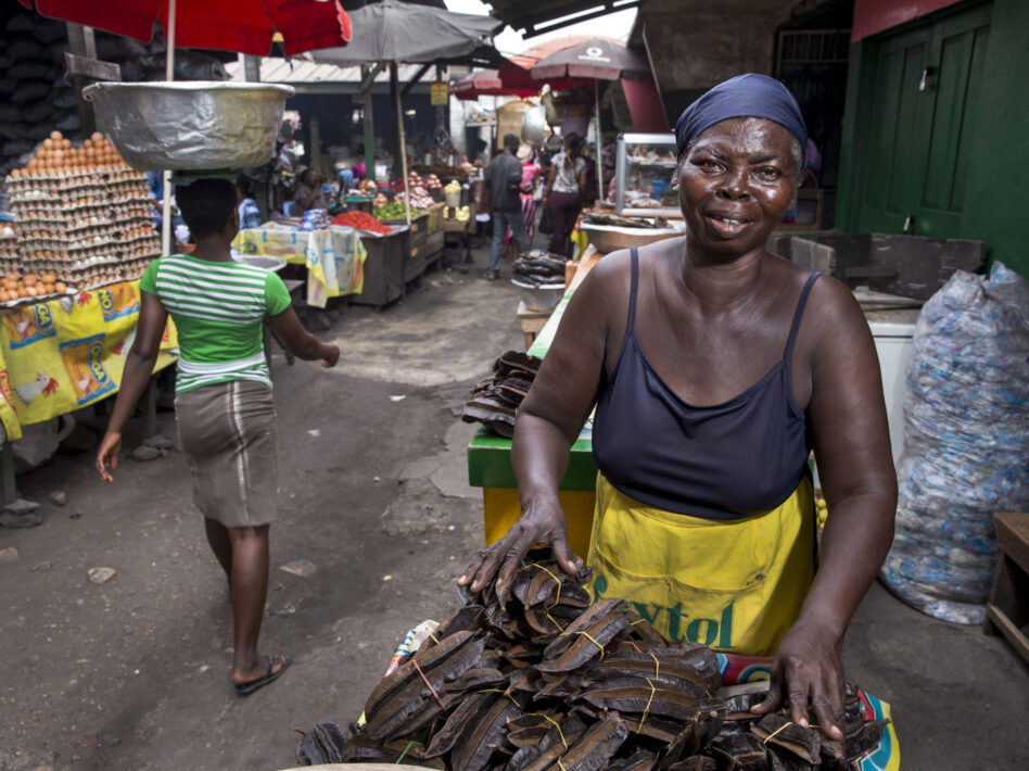 Mary Asomani at her stall in Makola Market selling prekese and bush meat