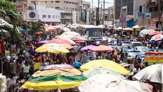 Street vendors and commuters interact in Accra's busy downtown.